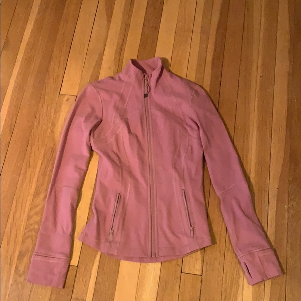 Pink Lululemon running jacket.